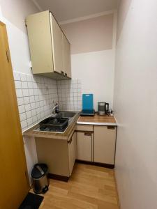 Kuchyň nebo kuchyňský kout v ubytování Monteurwohnung Bochum Wattenscheid