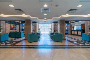Uma TV ou centro de entretenimento em Safir Marsa Matrouh Resort