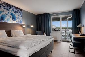 Voodi või voodid majutusasutuse TanumStrand SPA & Resort toas