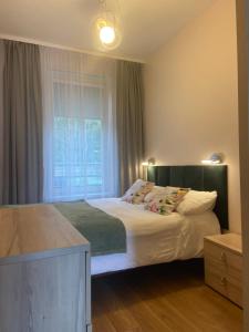 Posteľ alebo postele v izbe v ubytovaní Apartament Zen + 24 fotografií