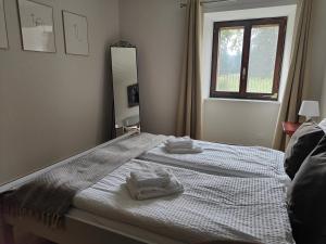 Postel nebo postele na pokoji v ubytování la ferme de la gaby