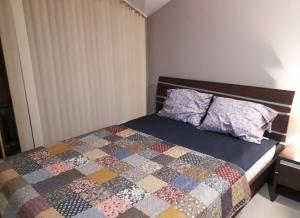Postel nebo postele na pokoji v ubytování Apartament by Zenit in Terra Complex Massonet D28 near Bansko