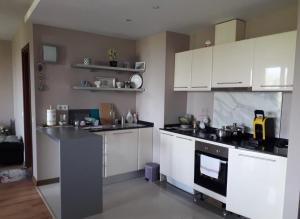 Kuchyň nebo kuchyňský kout v ubytování Apartament by Zenit in Terra Complex Massonet D28 near Bansko