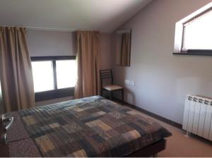 Postel nebo postele na pokoji v ubytování Apartament by Zenit in Terra Complex Massonet D28 near Bansko + 26 fotografií