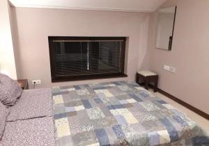 Postel nebo postele na pokoji v ubytování Apartament by Zenit in Terra Complex Massonet D28 near Bansko