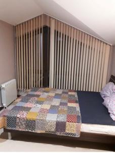 Postel nebo postele na pokoji v ubytování Apartament by Zenit in Terra Complex Massonet D28 near Bansko