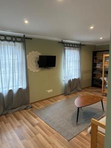 A television and/or entertainment centre at Engure apartment "Little one"