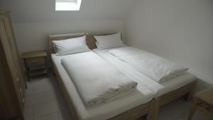 Postel nebo postele na pokoji v ubytování Fährhaus Hotel