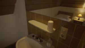 Koupelna v ubytování Fährhaus Hotel