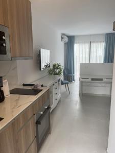 Kuchyňa alebo kuchynka v ubytovaní Estepona - Playa - Estudio con terrazas cerca del mar Pa6