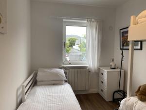 מיטה או מיטות בחדר ב-Apartment 454 - Roundstone