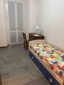 Cama o camas de una habitación en Appartamento Montegrappa in centro a Varese