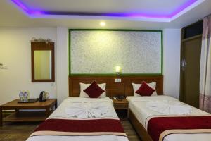 Un pat sau paturi într-o cameră la Hotel Sekai