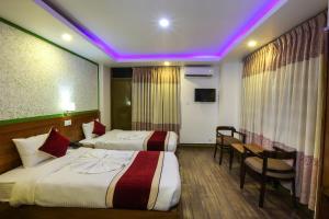 Un pat sau paturi într-o cameră la Hotel Sekai