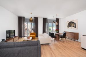 TV a/nebo společenská místnost v ubytování Swiss Hotel Apartments - Engelberg