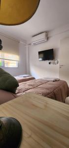 Cama ou camas em um quarto em AIRES DEL CERRO 4 Con cochera