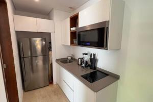 Η κουζίνα ή μικρή κουζίνα στο Oasis of Luxury and Comfort