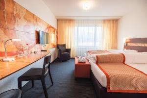 Postel nebo postele na pokoji v ubytování Hotel Seehof Superior + 37 fotografií