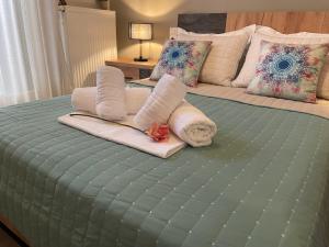 Posteľ alebo postele v izbe v ubytovaní Skiathos home