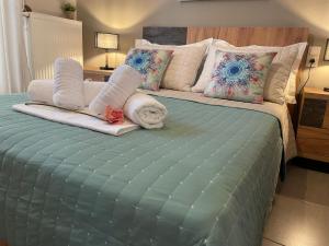 Posteľ alebo postele v izbe v ubytovaní Skiathos home