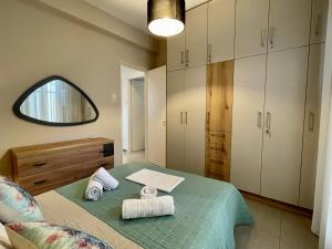Posteľ alebo postele v izbe v ubytovaní Skiathos home