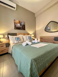Posteľ alebo postele v izbe v ubytovaní Skiathos home