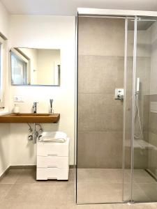 Koupelna v ubytování Streiter Rooms