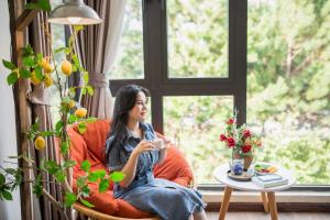 Posezení v ubytování Khai Ngoc Hotel Da Lat City
