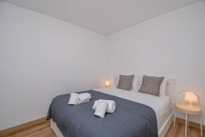 Postel nebo postele na pokoji v ubytování Charmoso apartamento com 1 quarto - 10 minutos da praia