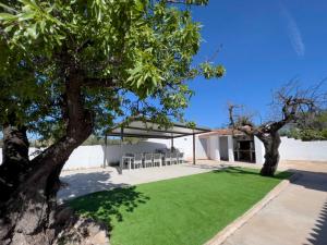 Fotografia z galérie ubytovania Villa con PISTA DE PADEL privada, piscina y Barbacoa, con más de 1800m2 de terreno, Villa Can Ramón v destinácii Papiolet