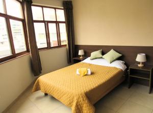 Katil atau katil-katil dalam bilik di Residencial Waldorf