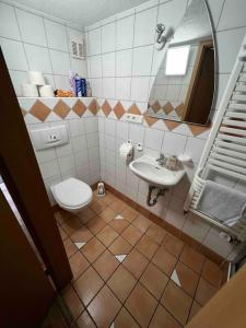 Koupelna v ubytování Gemütliche 1-Zimmer-Wohnung