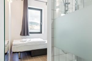 Postel nebo postele na pokoji v ubytování Augustus Hotel Bernkastel - Comfortable Budget Hotel