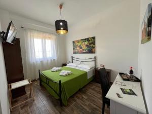 Posteľ alebo postele v izbe v ubytovaní B & B Vigna Di Filippo - Paestum