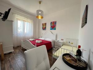 Posteľ alebo postele v izbe v ubytovaní B & B Vigna Di Filippo - Paestum