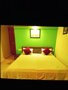 Postel nebo postele na pokoji v ubytování The Moon Light Home stay