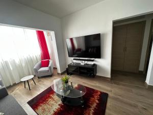 Posezení v ubytování Bávaro Apartamento 2bdr con Terraza y Jacuzzi Privado