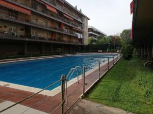 a large swimming pool in front of a building at ATeRIAN GAZTELU in Zarautz
