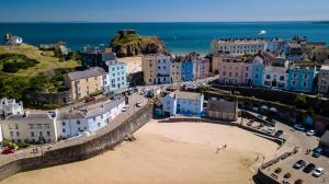 an aerial view of a town with a beach at Chart House 10 Guests in Tenby