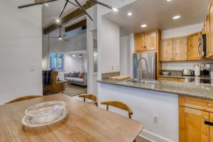 a kitchen with a wooden counter top and a wooden table at Inviting Tahoe Escape in Incline Village