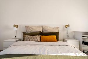 A bed or beds in a room at Apartment in Ferney near Geneva airport / UN / WHO