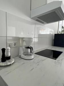 Kuchyň nebo kuchyňský kout v ubytování Paris to Bochum, 4 Pers. Apartm.