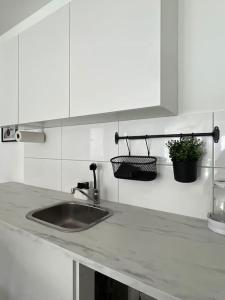 Kuchyň nebo kuchyňský kout v ubytování Paris to Bochum, 4 Pers. Apartm.
