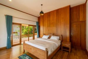 Letto o letti in una camera di 悬崖别墅 无边海景 直达海滩 五卧泰式独栋私人泳池别墅 超漂亮日出