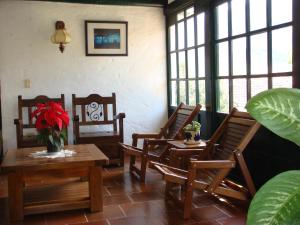 Zona de estar de Hotel Hospederia San Carlos Villa De Leyva