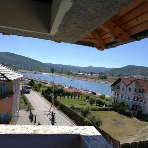 a view of a river from the balcony of a house at Apartment in Mitrovicë, Kosovë in Mitrovica