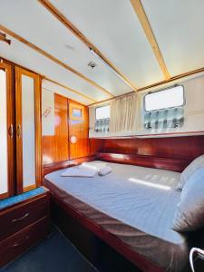 Postel nebo postele na pokoji v ubytování Beforelunch Cruise