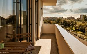 En balkong eller terrass på Bresidence Apartments with free private parking