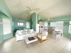 A seating area at Dragon Cay Resort Mudjin Harbour