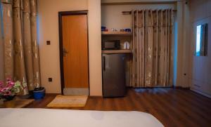 House of Forrest, Service Apartments客房内的一张或多张床位